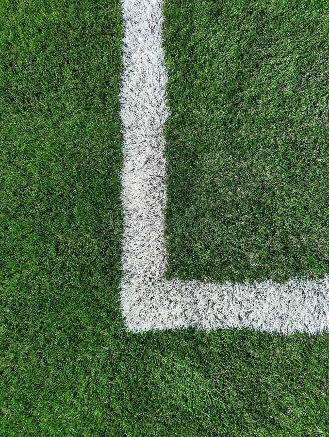 Close up of left corner of penalty box on soccer ptich. stock images