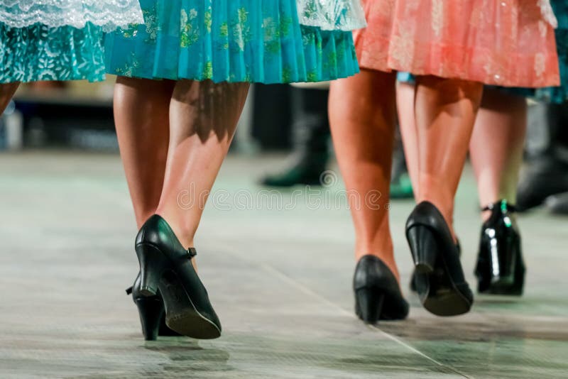 Close up of legs of young Romanian female dancers in traditional folkloric costume. Folklore of Romania royalty free stock images Close up of legs of young Romanian female dancers in traditional folkloric costume. Folklore of Romania royalty free stock images