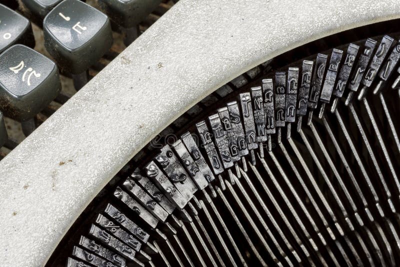 Close up of the letters on an old typewriter. Type, message.
