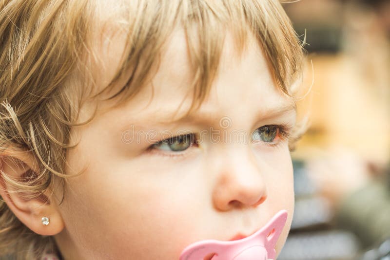 Close-up of a lovely child with beautiful eyes stock photos Close-up of a lovely child with beautiful eyes stock photos