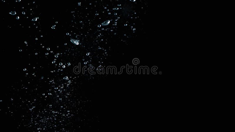 Close-up macro images of soda water bubbles floating up royalty free stock images