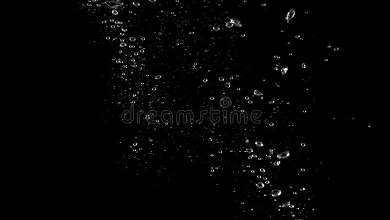 Close-up macro images of soda water bubbles floating up stock photography