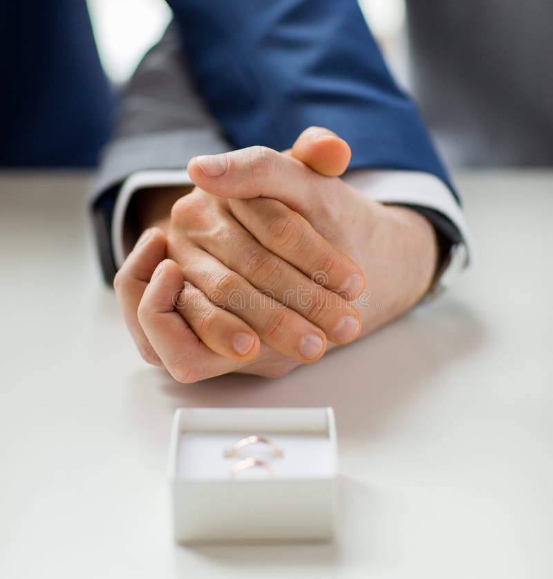 Close Up Of Male Gay Couple And Wedding Rings Stock Image Image - 800x837 - jpeg Gay Holding Hands Wedding Rings