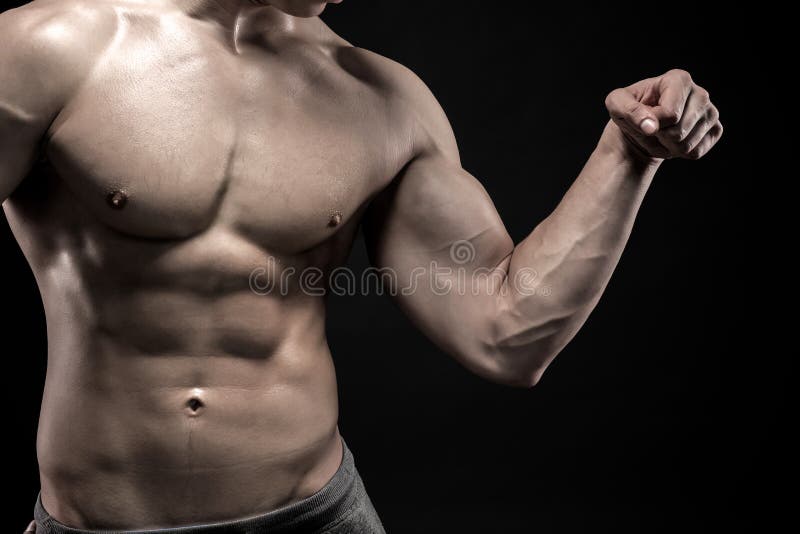 Close-up of Man Flexing Showing His Triceps, Biceps Muscles Stock Photo ...