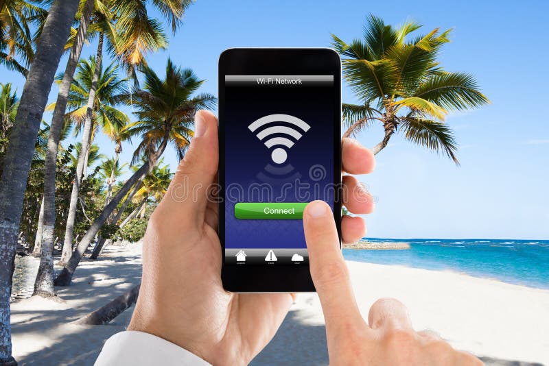 Close-up Of Man`s Hand Connected WiFi On Mobile Phone stock images
