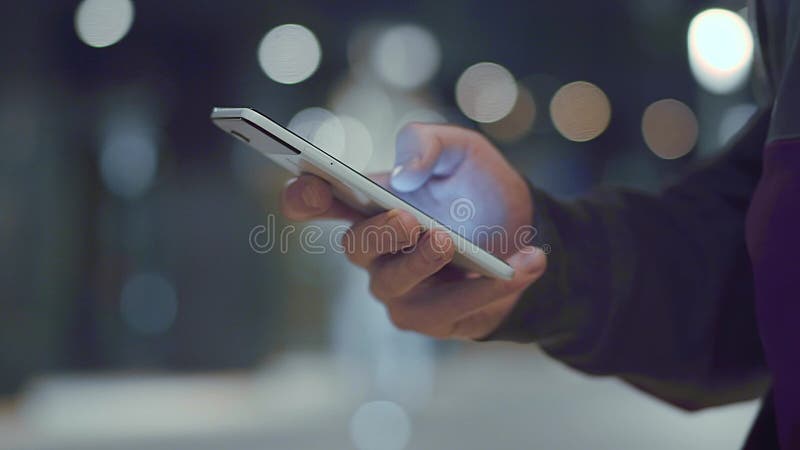 Close up of man`s hands holding cell phone stock video