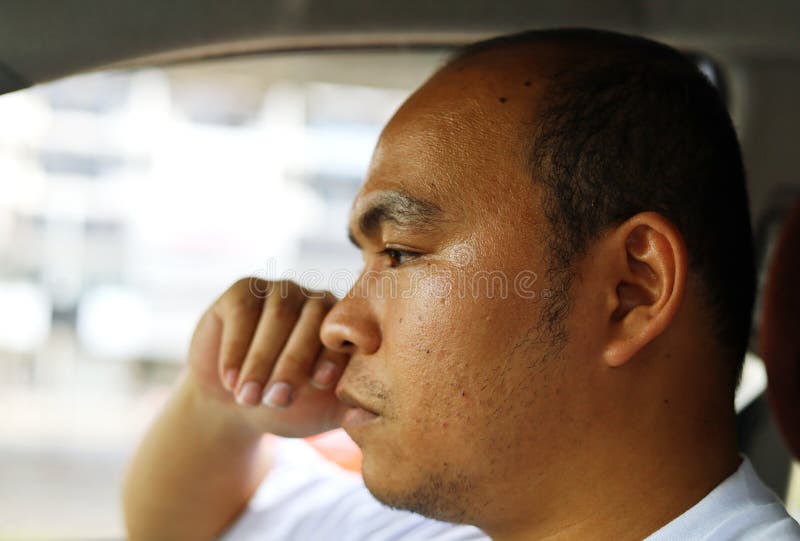 Close up Asia man sadness in driving cars on the road. royalty free stock photos Close up Asia man sadness in driving cars on the road. royalty free stock photos