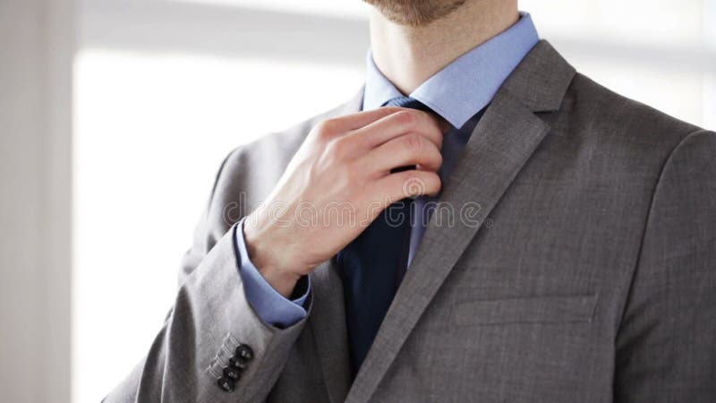 Close Up of Man in Suit Fastening Button on Jacket Stock Footage ...