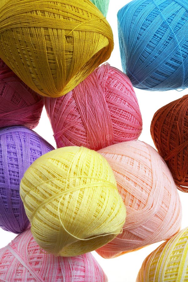 Yellow Ball Of Wool Yarn For Knitting Close Up On A White Background