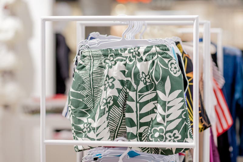 Close up Men`s swimming trunks in the store