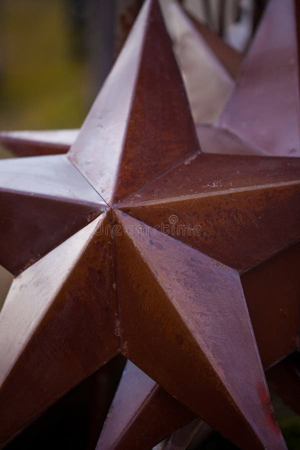 Close up of metal texas lone star/rusty metal star