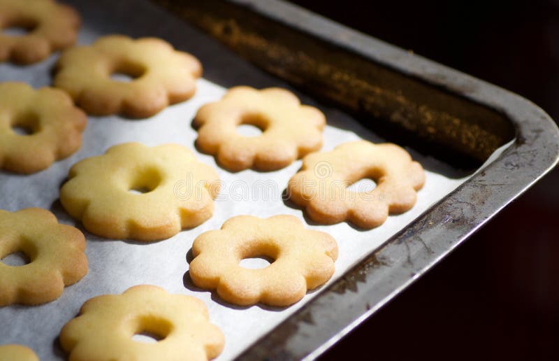 Close up of metallic baking tin with canestrelli biscuits stock photos