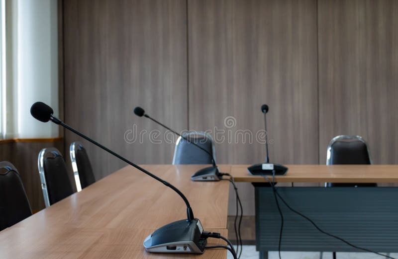 Close Up Microphone on Brown Table in Meeting Room Stock Photo Image