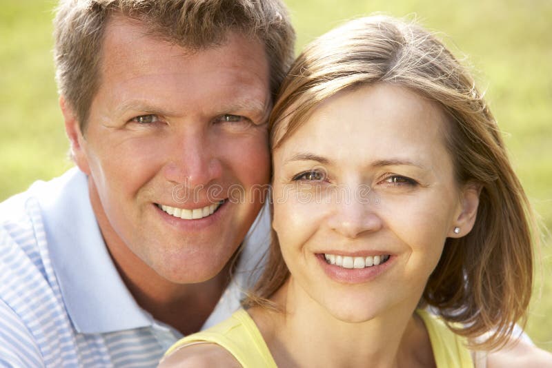 Close up of middle aged couple outdoors royalty free stock photo