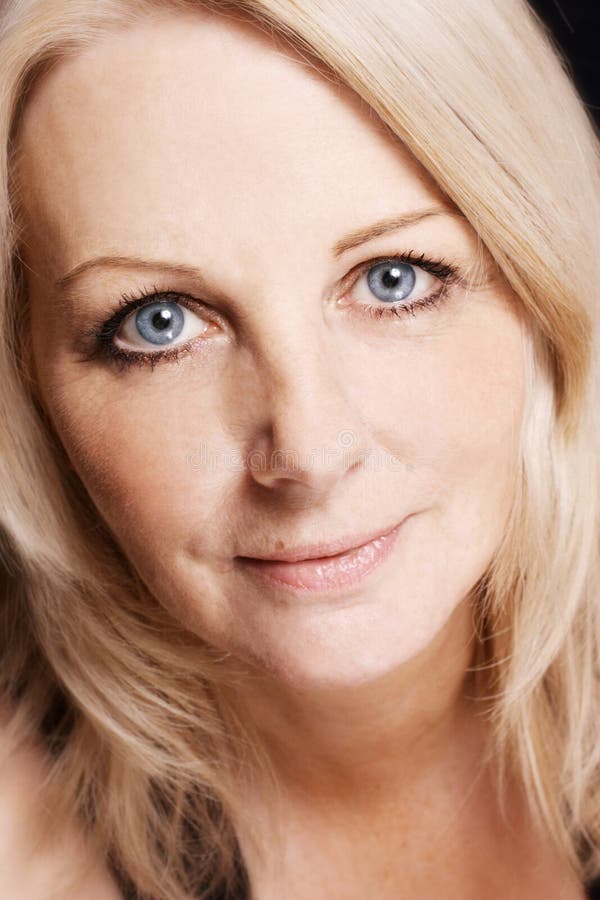 Close up of a middle aged woman stock photography