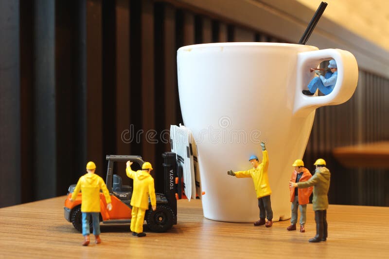 Close up Miniature people workers royalty free stock photo Close up Miniature people workers royalty free stock photo
