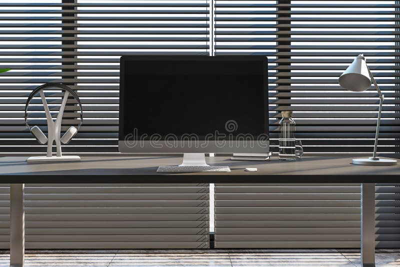 Close up of modern creative designer office interior with empty computer screen, headphones and other items on desktop. Blinds and daylight background. Mock up, 3D Rendering
