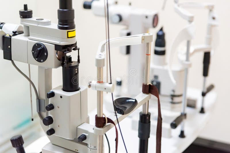 Close up modern ophthalmological laser used for eye surgery on table royalty free stock photo Close up modern ophthalmological laser used for eye surgery on table royalty free stock photo