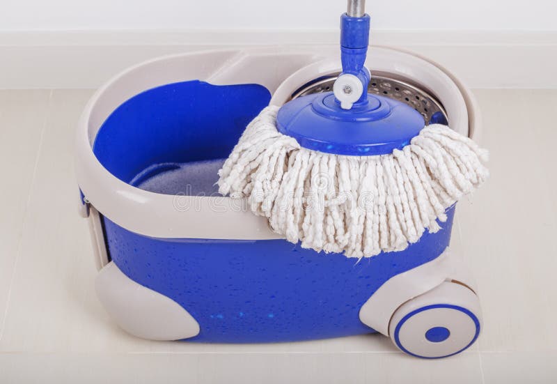 Close Up of Mop and Blue Bucket for Cleaning Floor Stock Image Image of buckets, housecleaning