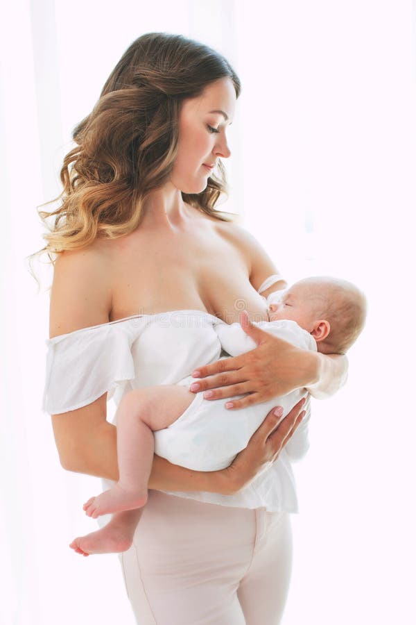 Nudist female breastfeeding