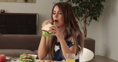 A Young Stylish Girl Smiles Gently and Shows Her Thumb Up, Meaning that Her  Sandwich is Very Tasty, and You Should Try Stock Photo - Image of  lifestyle, american: 118096764