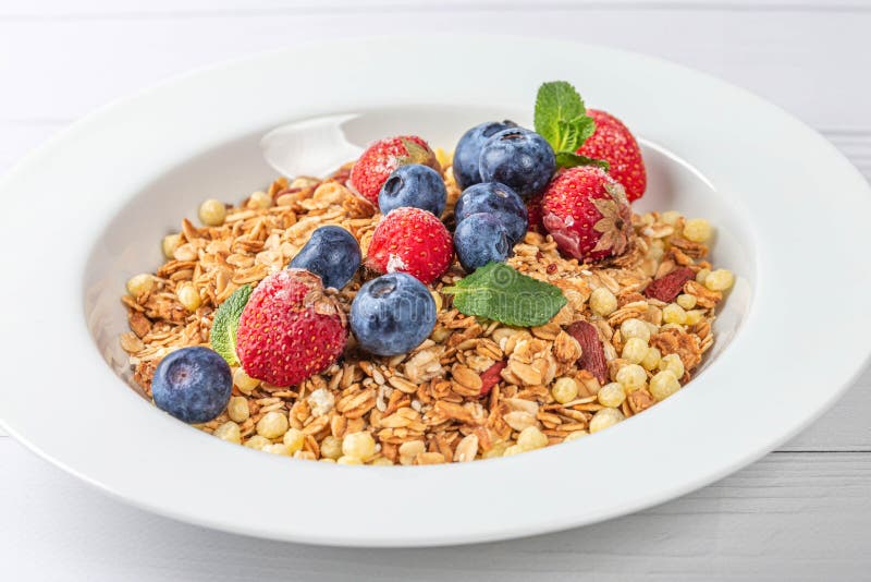 Closeup, Multicereal Breakfast with Seeds, Dry Berries, Strawberries
