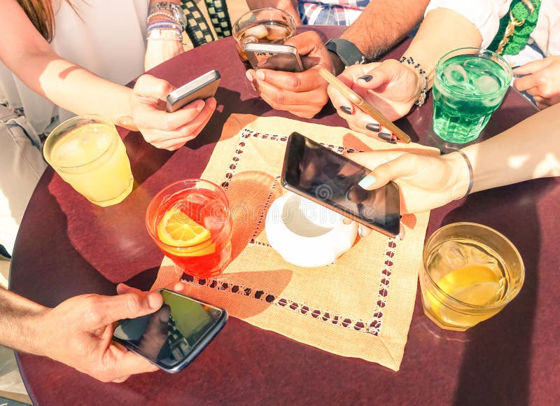 Close up of multiracial friends group with mobile smart phones royalty free stock photography Close up of multiracial friends group with mobile smart phones royalty free stock photography