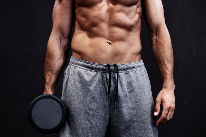 Muscular Bodybuilder Guy Doing Exercises with Gifts Over White B