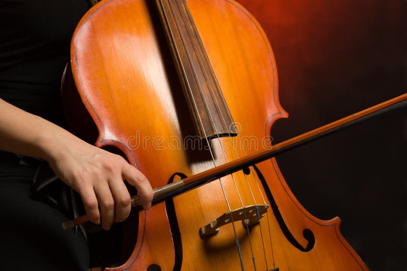 Close up musician hands with cello