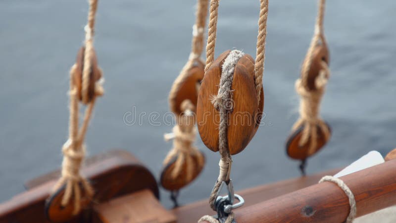 Close-up of new blocks and rigging on a wooden ship