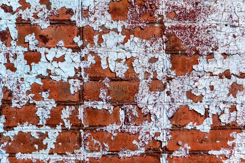Old red brick wall with cracked paint royalty free stock photos Old red brick wall with cracked paint royalty free stock photos