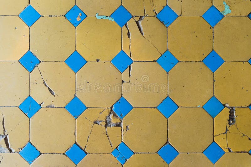 Closeup of an Old Floor Tile with a Twotone Pattern. Chapped Floor