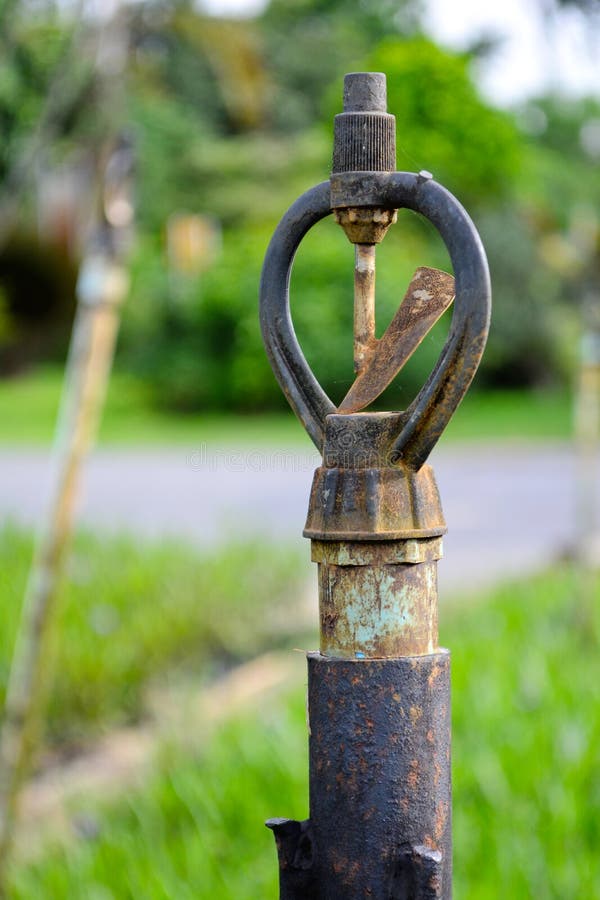 Close Up Old Sprinkler Head. Stock Image Image of landscape, green