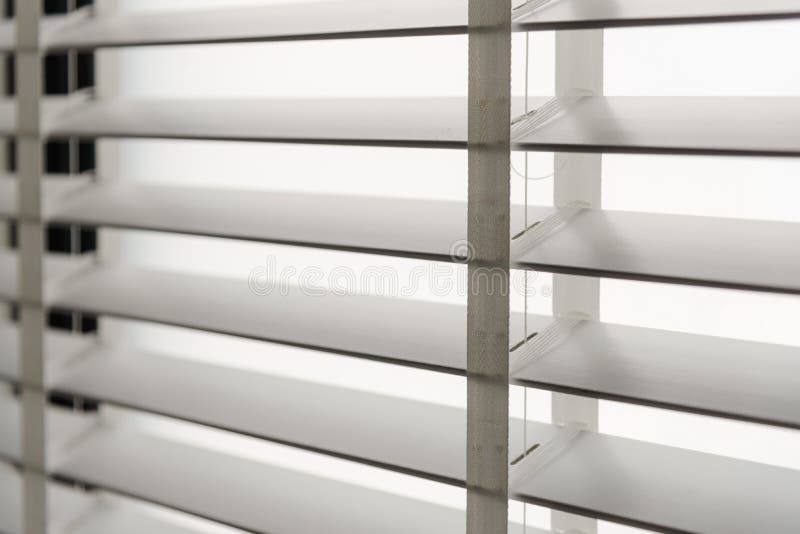 Close-up open venetian blinds. lighting range control sunlight coming from a window. decoration interior. Modern jalousie