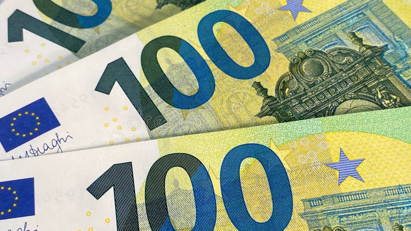 Close-up of part of one hundred euro bills. Single currency of the European Union. European currency. 100 euro. Cash banknotes.