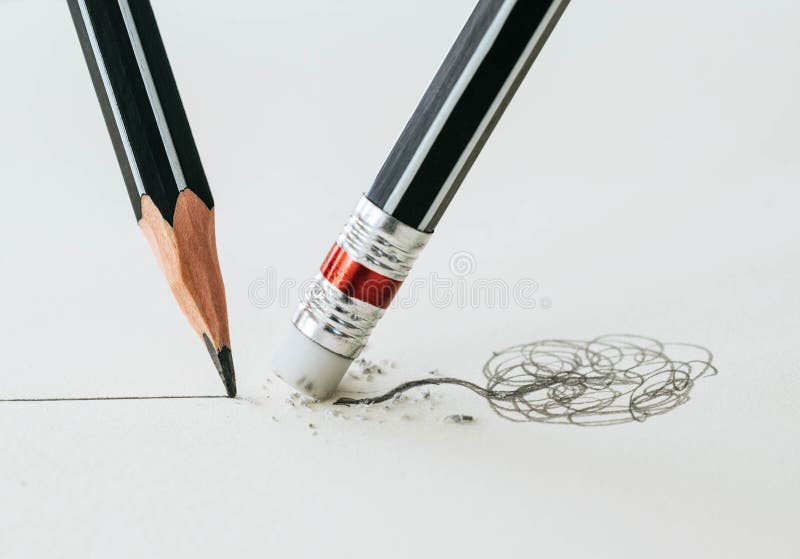 Close up of a pencil eraser removing a crooked line and the close up of a sharpened pencil writing a straight line. royalty free stock photo Close up of a pencil eraser removing a crooked line and the close up of a sharpened pencil writing a straight line. royalty free stock photo