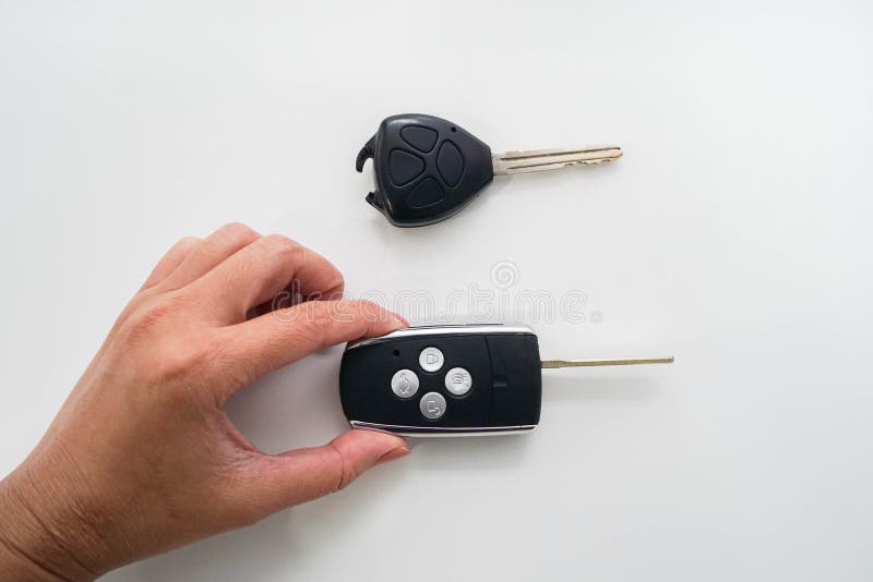 People hold car modern remote control replaced the broken old remote control royalty free stock photos