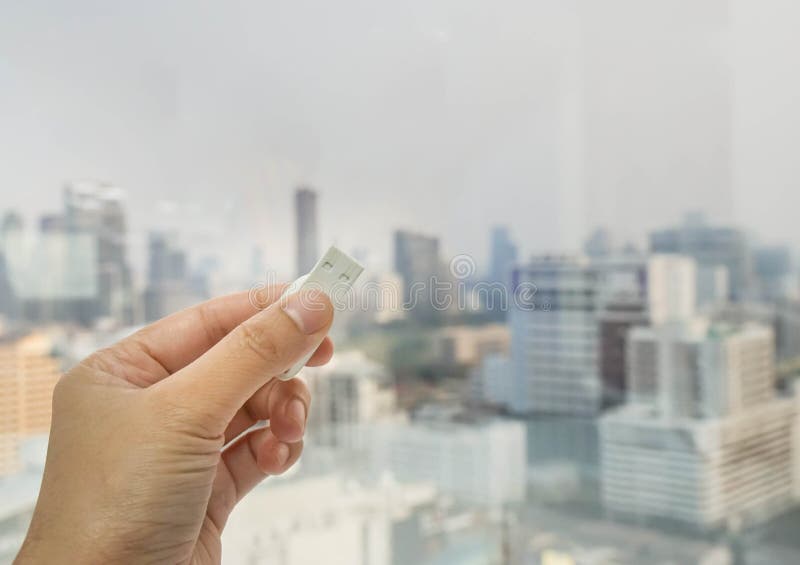 People hold classified flash drive data storage in hand stock photography