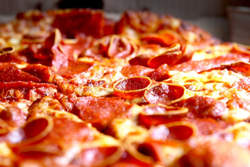 Pepperoni Pizza With Crispy Pepperonis On Table Close Up Stock Photo