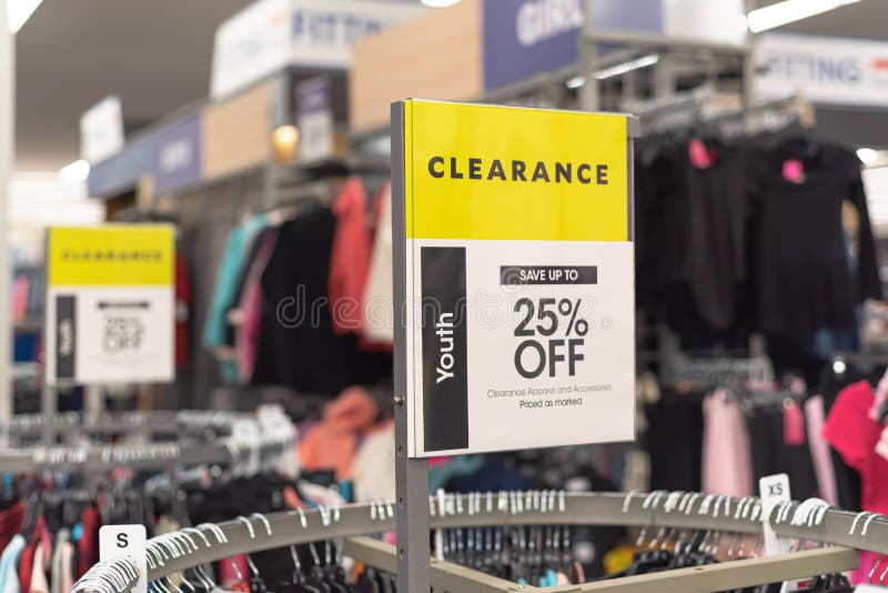 Clearance Sign for 25 Percent Off with Blurry Modern Women Clothing at  Fashion Store in America Stock Image - Image of commerce, advertisement:  228175387