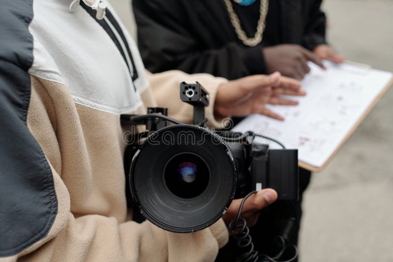 Operating Professional Video Camera for Filming Project royalty free stock photos