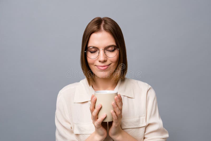 Close up photo beautiful amazing cute she her business lady hands arms hot beverage lunch free time eyes closed royalty free stock image Close up photo beautiful amazing cute she her business lady hands arms hot beverage lunch free time eyes closed royalty free stock image