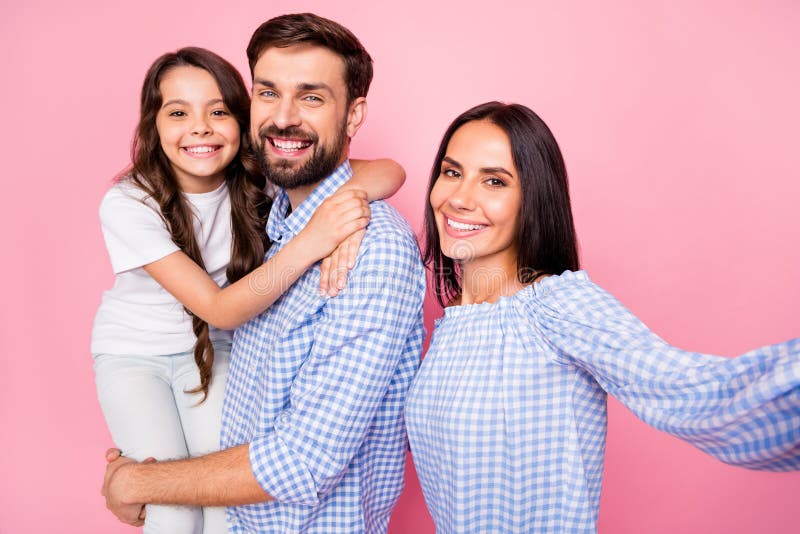 Close up photo of cheerful people making photo memory wearing checkered shirt t-shirt isolated over pink background stock photo Close up photo of cheerful people making photo memory wearing checkered shirt t-shirt isolated over pink background stock photo
