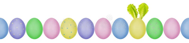 Close up photo of colorful painted Easter eggs with eggshell texture in a row. One egg with bunny ears made of salad leaves