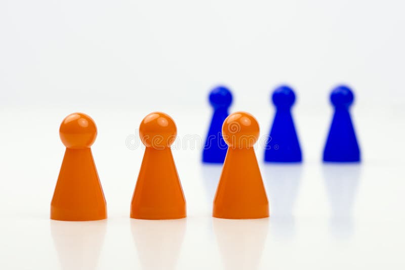 Close-up photo of a group of different-colored pieces in different positions on a white background royalty free stock images