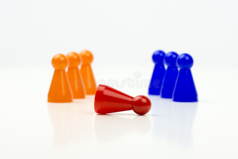 Close-up photo of a group of different-colored pieces in different positions on a white background royalty free stock image