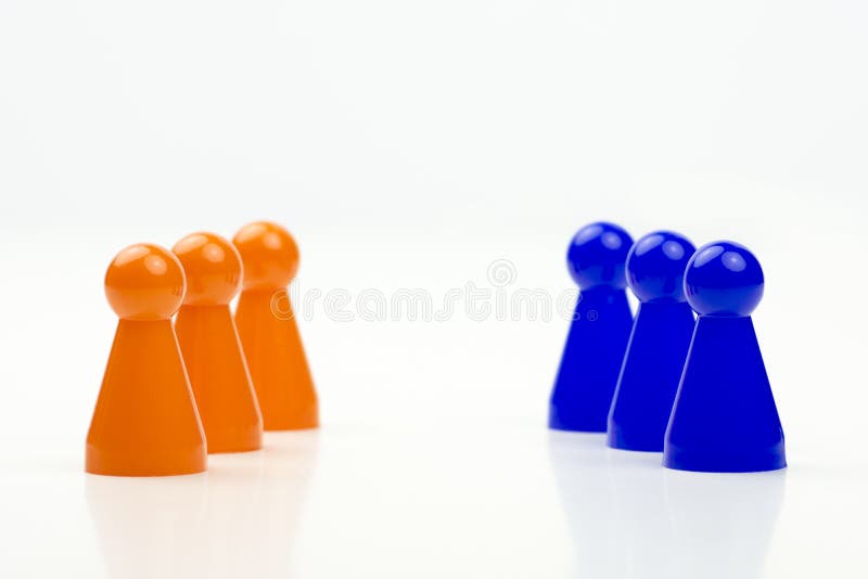 Close-up photo of a group of different-colored pieces in different positions on a white background royalty free stock photos