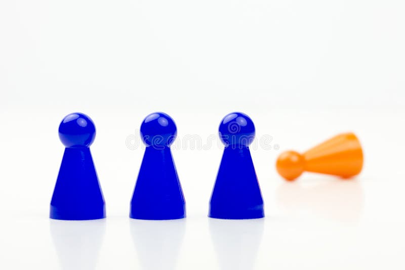 Close-up photo of a group of different-colored pieces in different positions on a white background stock photo