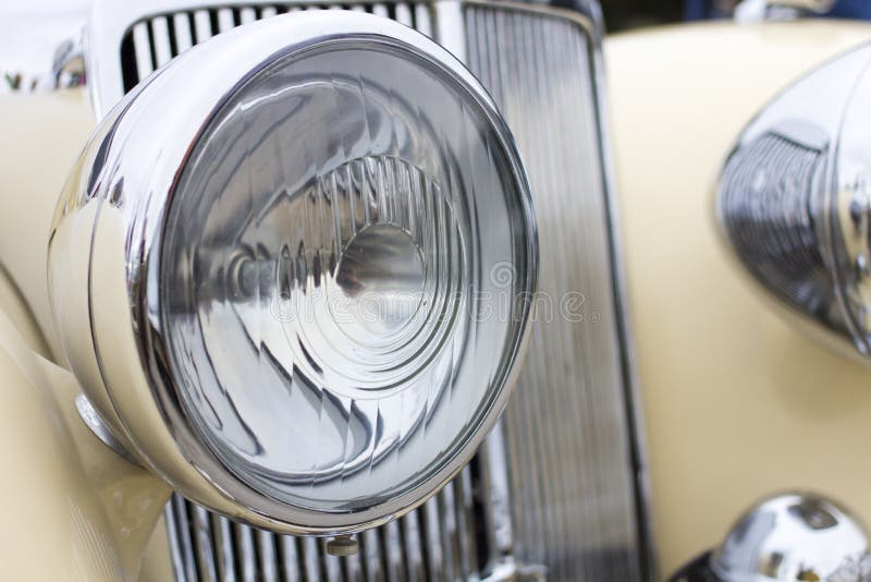 Close up photo of headlight retro car stock photo