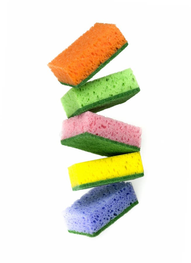 Close-up photo of multi-colored foam cleaning sponges on a white background, macro. Multi colored foam sponges stock images, royalty-free photos and pictures